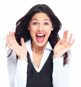 A young woman smiling after teeth whitening treatments in Plantation, FL.